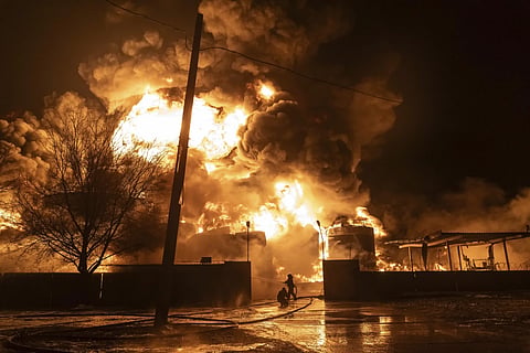 Firefighters extinguish a fire after a Russian attack on a residential neighborhood in Kharkiv, Ukraine, Saturday, Feb 10, 2024. 