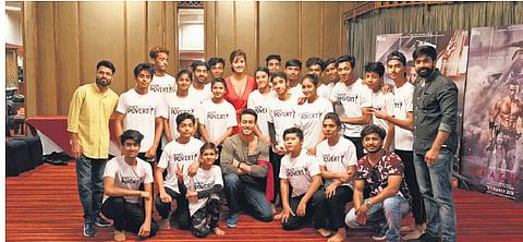 (Extreme right) Vinay Sharma with actors Tiger Shroff, Disha Patani and his team.