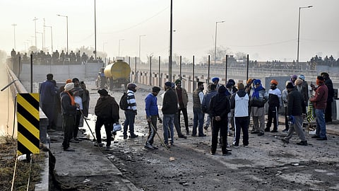 Farmers gathered at the Punjab-Haryana Shambhu border during the second day of their 'Delhi Chalo' march, near Patiala, Wednesday, Feb. 14, 2024.