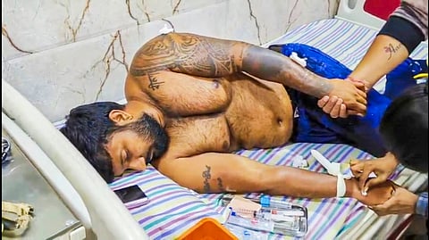 Shiv Sena leader Rahul Patil receives treatment in a hospital after he was allegedly shot by BJP MLA Ganpat Gaikwad, Friday, Feb. 2, 2024. 