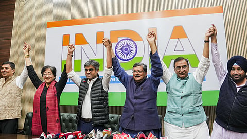 AAP leaders Saurabh Bharadwaj, Atishi Singh and Sandeep Pathak with Congress leaders Mukul Wasnik, Deepak Babaria and Arvinder Singh Lovely during a joint press conference, in New Delhi.