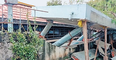 Hariram (inset) got trapped under the scaffolding while he was working to lift the temple in Adambakkam on Monday, Feb 12, 2024. 