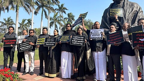 "We are not asking for relief --- give us our rights": Tamil Nadu MPs protest against the Union govt's alleged neglect of the state, in front of the Gandhi statue in the Parliament complex, in New Delhi, on Feb 8, 2024.
