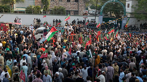 Supporters of Pakistan's Former Prime Minister Imran Khan's party 'Pakistan Tehreek-e-Insaf' hold a protest against alleged vote-rigging in some constituencies in the parliamentary elections, in Karachi on Feb. 11, 2024. 