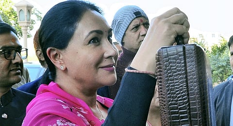 Rajasthan Deputy Chief Minister and Finance Minister Diya Kumari arrives at the Rajasthan Assembly to present the state interim budget, in Jaipur, Thursday, Feb. 8, 2024. 