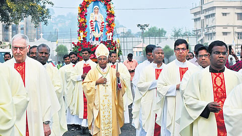 Bishop T Rajarao, along with other Catholic priests, taking out a procession with the idol of  Mary Matha in Vijayawada on Friday.