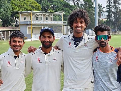Sai Kishore, third from left, with team members.