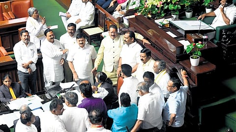 BJP members on merry-go-round in the well of the Assembly on Thursday 
