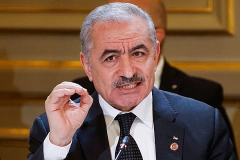 Palestinian Prime Minister Mohammed Shtayyeh speaks during a meeting with officials from Western and Arab nations, the United Nations and non-governmental organizations.