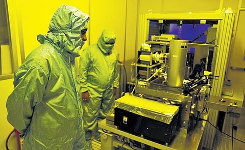 Students and faculty members conduct experiments at the ‘clean room’ facility at CASEST of the University of Hyderabad. 