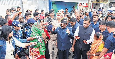 Governor CV Ananda Bose interacts with protestors at Sandeshkhali block.