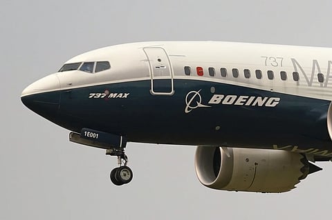 A Boeing 737 Max jet prepares to land at Boeing Field following a test flight in Seattle, Sept. 30, 2020.
