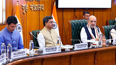 Union Home Minister Amit Shah with Tripura Chief Minister Manik Saha and others during the signing of agreement between TIPRA Motha and the governments of Tripura and India, in New Delhi, Saturday, March 2, 2024. 