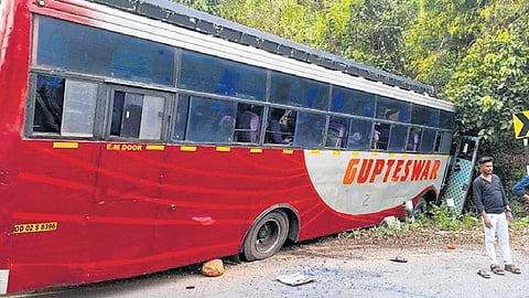 The ill-fated bus after the accident at Taptapani Ghat. 