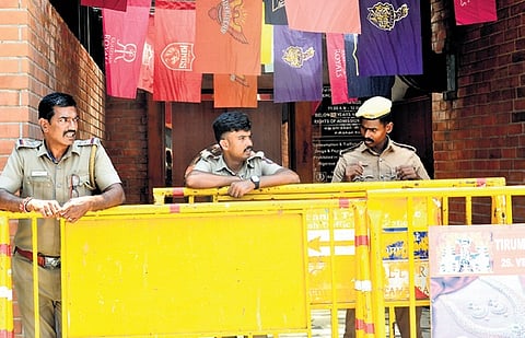 Police personnel deployed outside the private pub in Alwarpet 