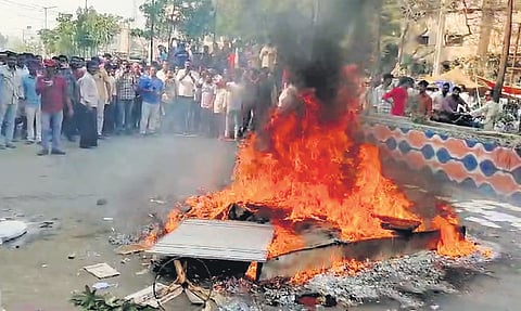 TDP cadre set campaign material on fire resenting the allotment of party ticket to Gummanur Jayaram in Guntakal on Friday 