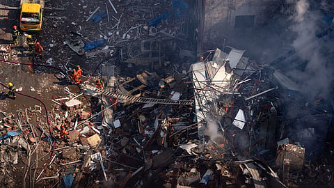 Firefighters work the scene of an explosion in Sanhe city in northern China's Hebei province.