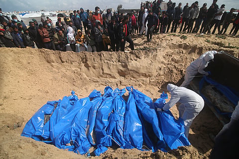 Palestinians attend a mass funeral of people killed in the Israeli offensive on Khan Younis in Rafah, Gaza Strip.