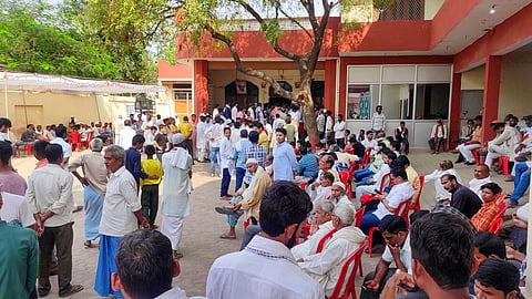  Locals gather outside the residence of the jailed gangster-turned-politician Mukhtar Ansari who died of cardiac arrest at a hospital in Banda, at his native place at Mohammadabad, in Ghazipur district.