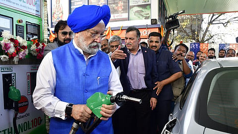 Union Minister of Petroleum and Natural Gas Hardeep Singh Puri fills a car with Ethanol-blended petrol during the launch of 'Ethanol 100''