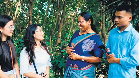Vadakara LDF candidate K K Shailaja interacts with Manipur students in Kannur