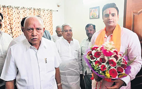 Scion of erstwhile Mysuru royal family Yaduveer Krishnadatta Wadiyar meets 
BJP leader BS Yediyurappa at the latter’s residence in Bengaluru on Thursday