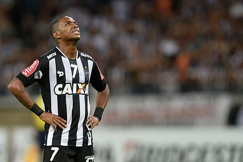 Journalists flocked to Robinho's luxury condominium in Guaruja, near Santos, but his arrest wasn't caught on camera. 
