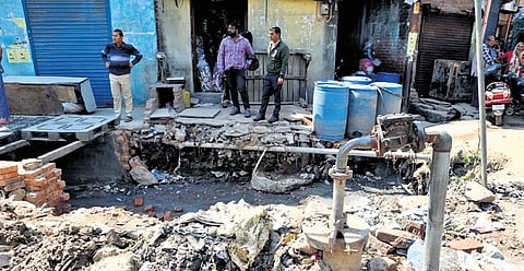 Damaged roads near  Sangam Vihar.