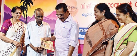 Writer George Onakkoor releases the book ‘Kumaranasan Vairagiyile Anuragi, penned by the late poet Vishnu Narayanan Namboothiri on Sunday 