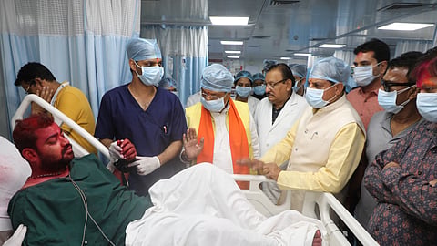 Madhya Pradesh CM Mohan Yadav with those injured in the fire that broke out in the Mahakal Temple in Ujjain in Madhya Pradesh on Monday during 'bhasma aarti'.