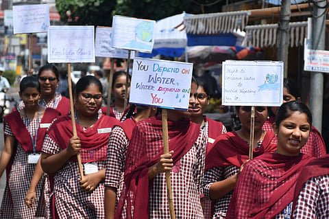 Students of Maris Stella college take part in a rally on the occasion of World Water Day in Vijayawada on March 22, 2024.