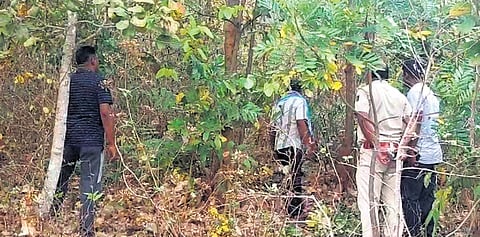 Police along with the scientific team at the spot where the girl’s body was found