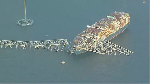 Parts of the Francis Scott Key Bridge remain after a container ship collided with one of the bridge’s support Tuesday, March 26, 2024 in Baltimore. 