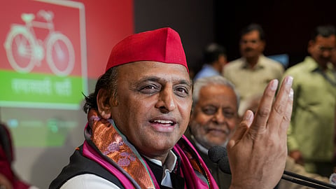 Samajwadi Party President Akhilesh Yadav addresses a press conference at the party office, in Lucknow, Friday, March 1, 2024.