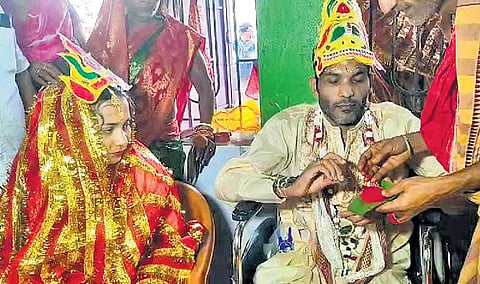 Bidusmita and Basanta tying the nuptial knot at Tarini temple
