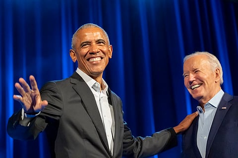 President Joe Biden, right, and former presidents Barack Obama, left, and Bill Clinton participate in a fundraising event with Stephen Colbert at Radio City Music Hall.