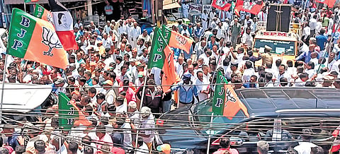 BJP functionaries took out a rally to the Coimbatore collectorate along with candidate L Murugan on Monday 