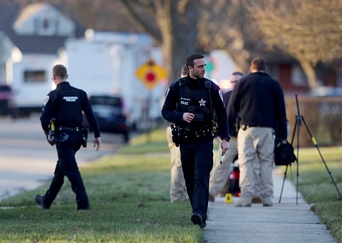 Police investigate stabbings Wednesday.