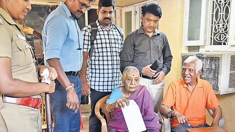 An elderly couple casting their postal vote at their Kolathur residence, for the Chennai North constituency Lok Sabha election, on Monday 