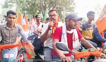 BJP workers take out a bike rally protesting candidature of Braja Mohan Pradhan for Jaleswar constituency