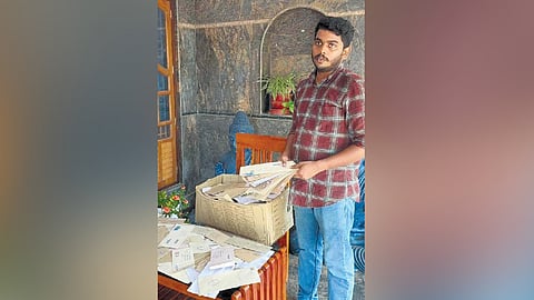 M V Shilparaj with his RTI applications. 