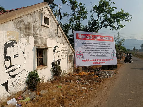 Adi Dravidar Story: Banner put up by the Adi Dravidar community near the Mothakkal village entrance 

