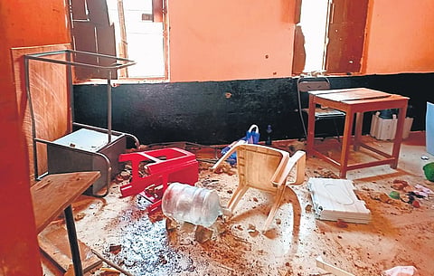 A polling booth vandalised in Indiganatta village of Hanur taluk in Chamarajanagar district on Friday 