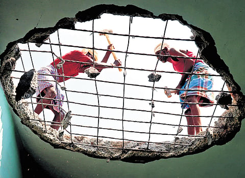 Construction labourers at work.