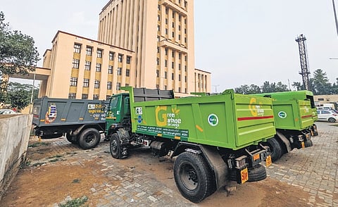 Brand new trucks to be used for carrying garbages parked at BMC office premises in Bhubaneswar. 