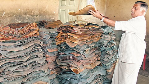 Sibi Kalurkulangara arranges rubber sheets at his shop in Erumeli 
| pics: Shaji Vettipuram