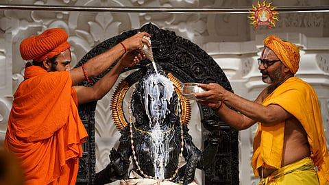 Priests perform 'abhishek' of Ram Lalla on the occasion of 'Ram Navami' festival, at the Ram Temple in Ayodhya, Wednesday, April 17, 2024. 