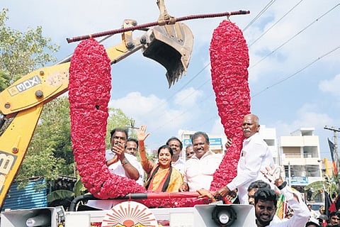 DMK candidate Thamizhachi Thangapandian being offered a 450kg rose garland in Chennai last week