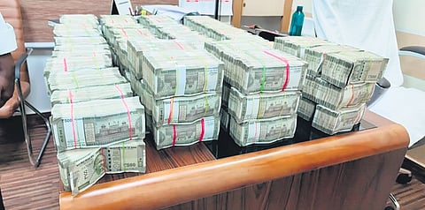 Flying Squad teams at Tambaram seized Rs 3.98 crore in Rs 500 notes from three men travelling on the Nellai Superfast Express on Saturday night 