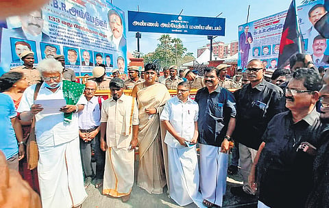 A group of 20 people were made to wait by police near mani mandapam